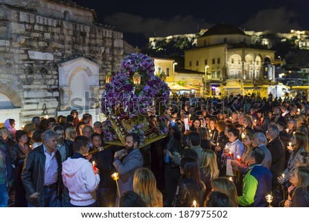 ATHENS,GREECE - APR 18 :Good Friday epitaph procession in Athens,the Epitaph is carried out from the church and the streets are full with Athenians,carrying candles ,April 18, 2014 in Athens,Greece