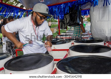 PORT OF SPAIN, TRINIDAD - August 9: Band members practice outside the venue of the International Steelband Panorama Contest , August 9, 2015 in Queen\'s Park Savannah Port of Spain,Trinidad.