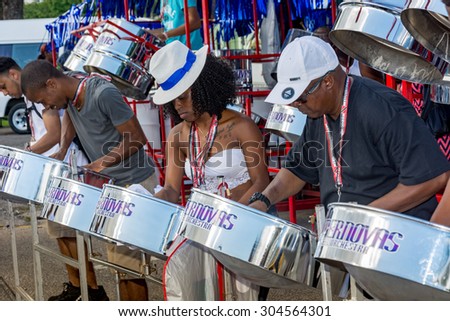 PORT OF SPAIN, TRINIDAD - August 9: Band members practice outside the venue of the International Steelband Panorama Contest , August 9, 2015 in Queen's Park Savannah Port of Spain,Trinidad.
