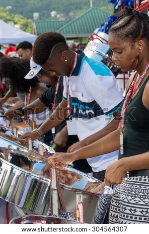 PORT OF SPAIN, TRINIDAD - August 9: Band members practice outside the venue of the International Steelband Panorama Contest , August 9, 2015 in Queen\'s Park Savannah Port of Spain,Trinidad.