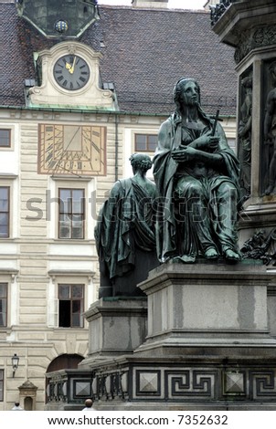 some statues at the hofburg winter palace central square
