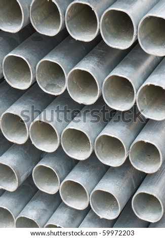 Pile of galvanized steel tubes for use under construction work
