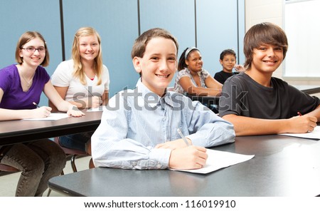 Diverse group of middle-school children in class.