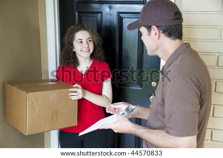 Delivery man brings a package to a customer\'s door and waits for a signature.