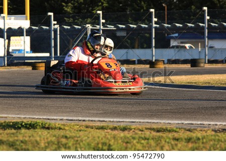 LEIRIA, PORTUGAL - JANUARY 28: An unknown driver/team participating in Old Motor Club Of Marinha Grande Karting Race, organized by Motor Club Of Marinha Grande, in Leiria, Portugal on January 28, 2012.