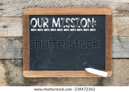 Our mission sign. Our mission sign on chalkboard
