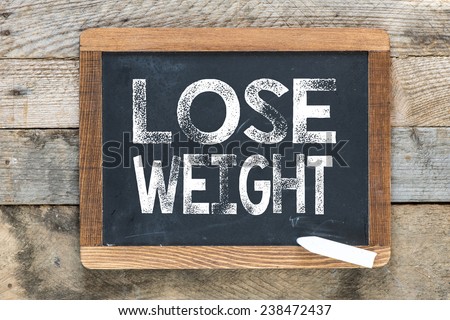Weight lose sign. Weight lose sign on chalkboard