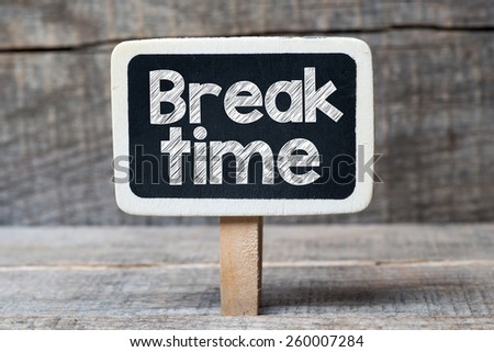 Break time handwritten on blackboard. Break time handwritten on framed blackboard