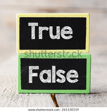 True or False Blackboards. True or False Blackboards on wood background