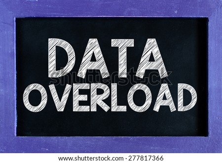 Data overload On blackboard background