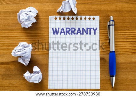 Blank note paper with warranty. Blank note paper with warranty and pen on wood background