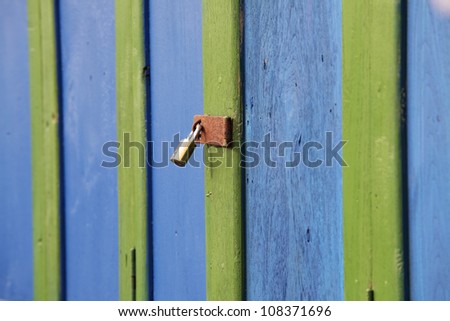 colorful door with iron door locked