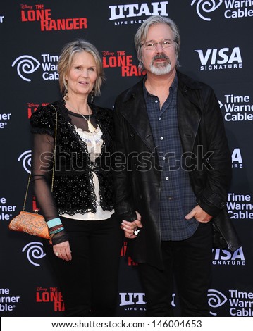LOS ANGELES - JUN 22:  Gore Verbinski & wife Clayton arrives to the \'The Lone Ranger\' Hollywood Premiere  on June 22, 2013 in Hollywood, CA
