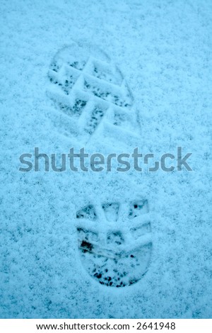 ice blue footprint in the snow