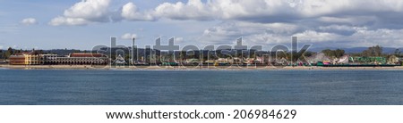 Santa Cruz, CA - March 30: Panorama view of  Santa Cruz Beach Boardwalk with amusement park March 30, 2014 in Santa Cruz, CA