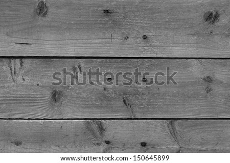 Aged wood on the side of a barn.