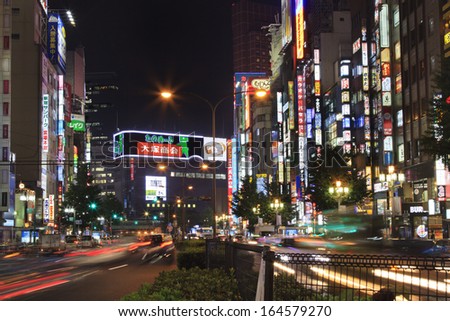 Shinjuku, Tokyo, Japan - August 6, 2013: Night traffic and neon lights of Shinjiku. Shinjiku a special ward located in Tokyo Metropolis, Japan.