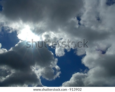 Sun peeking though break in clouds - illustrating hope