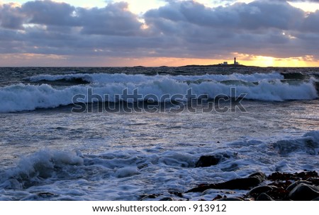 Lighthouse and oceanwaves at sunset - North Sea, Sele, Norway