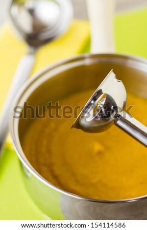 Part of a series showing the preparation of Spiced Carrot and Lentil Soup.