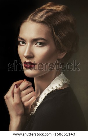 old-fashioned woman at window
