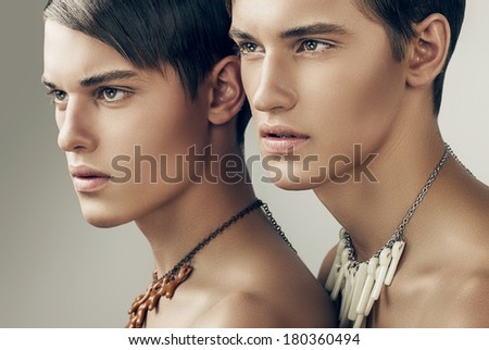 handsome adult men in necklaces