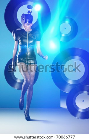 Disco woman dancing with vinyl records and neon lights