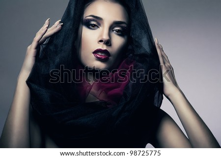 attractive woman in black hood