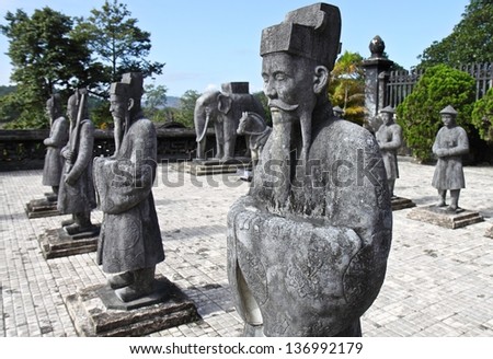 HUE, VIETNAM - DECEMBER 16: Government official statues at the tomb of Emperor Khai Dinh(early 20 century), where about 10 kilometers from Hue city. December 16, 2012 in Hue, Vietnam.