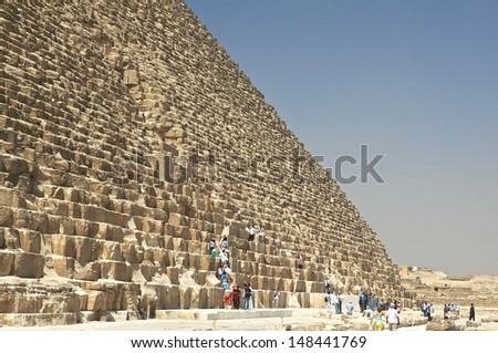 GIZA, EGYPT - MAY 31:Tourists in Pyramid of Khufu on May 31, 2011, at Giza, Egypt. The world\'s oldest tourist attraction, only one of the seven wonders of the ancient world still remaining.
