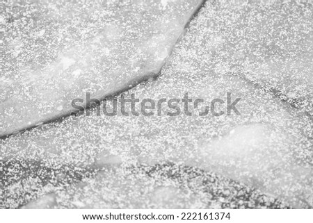 Ice flowers, snow and ice on the water surface - texture