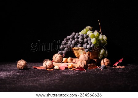 Still life composition with fruits and vegetables on black, dusty surface