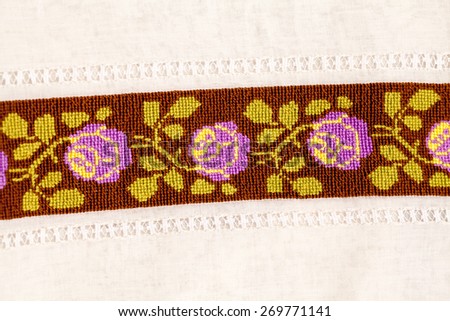 Vintage textile texture with beautiful, fine embroidery