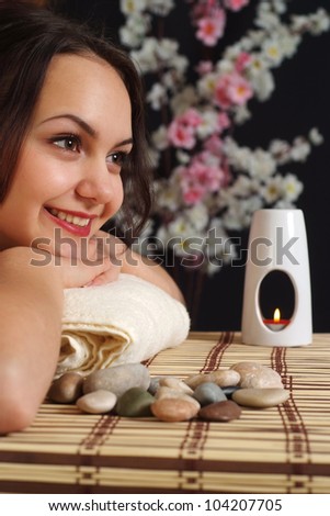 Happy Caucasian female at a reception in the spa salon