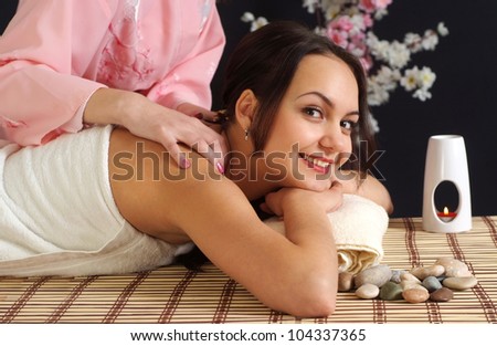 Good Caucasian woman at a reception in the spa salon