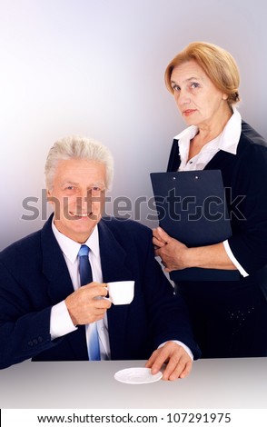 Elderly businessman and his loyal secretary