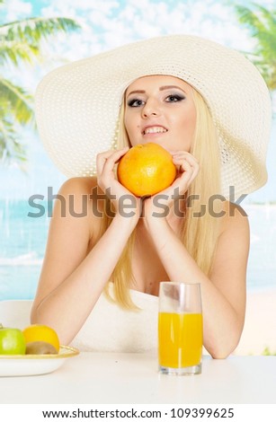 Superb blonde with a bright appearance is resting at a resort
