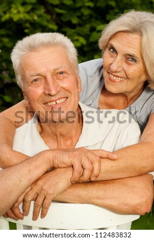 Happy elderly couple enjoying each other\'s company on the nature
