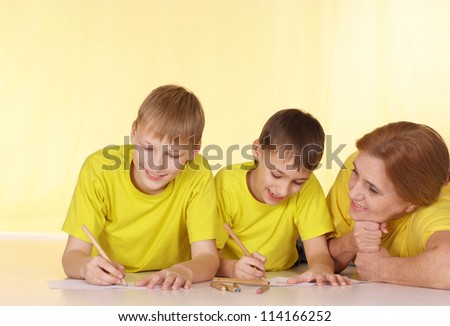 Good family in yellow t-shirts having a good time together