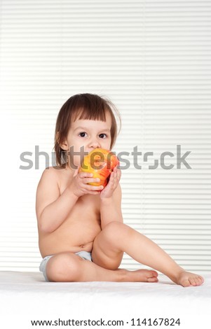 Small girl in the office of an experienced doctor on a white background