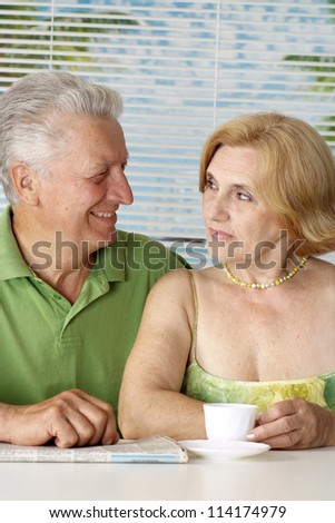 Nice old  couple went to a resort vacation