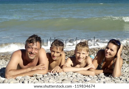 Cheerful family have a great time with each other\'s