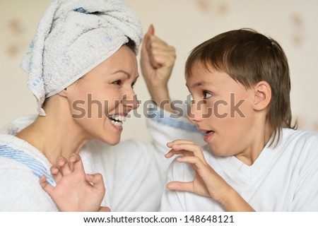 mother scolds his young son