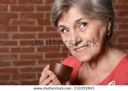 Portrait of an attractive middle-aged woman at home