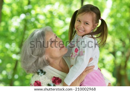 Grandmother with her granddaughter for a walk
