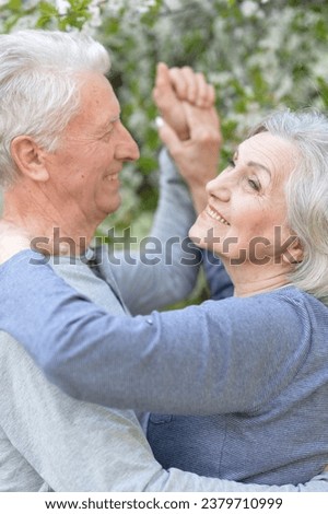 Similar – Image, Stock Photo Senior couple in autumn park