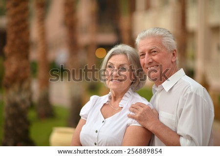 Happy Mature couple in love enjoy fresh air and stunning view on vacation