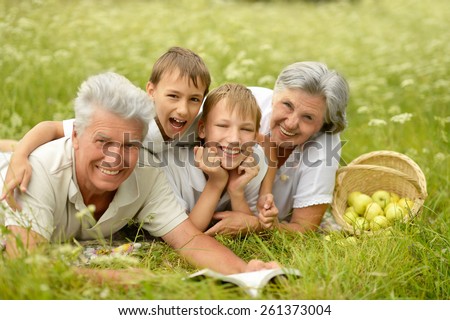 Happy family having a picnic on a sunny summer day