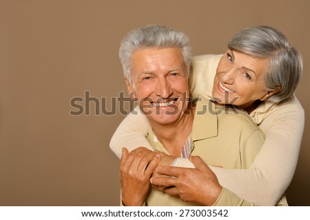 Portrait of amusing happy smiling old couple