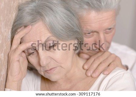 Sad Elderly couple together